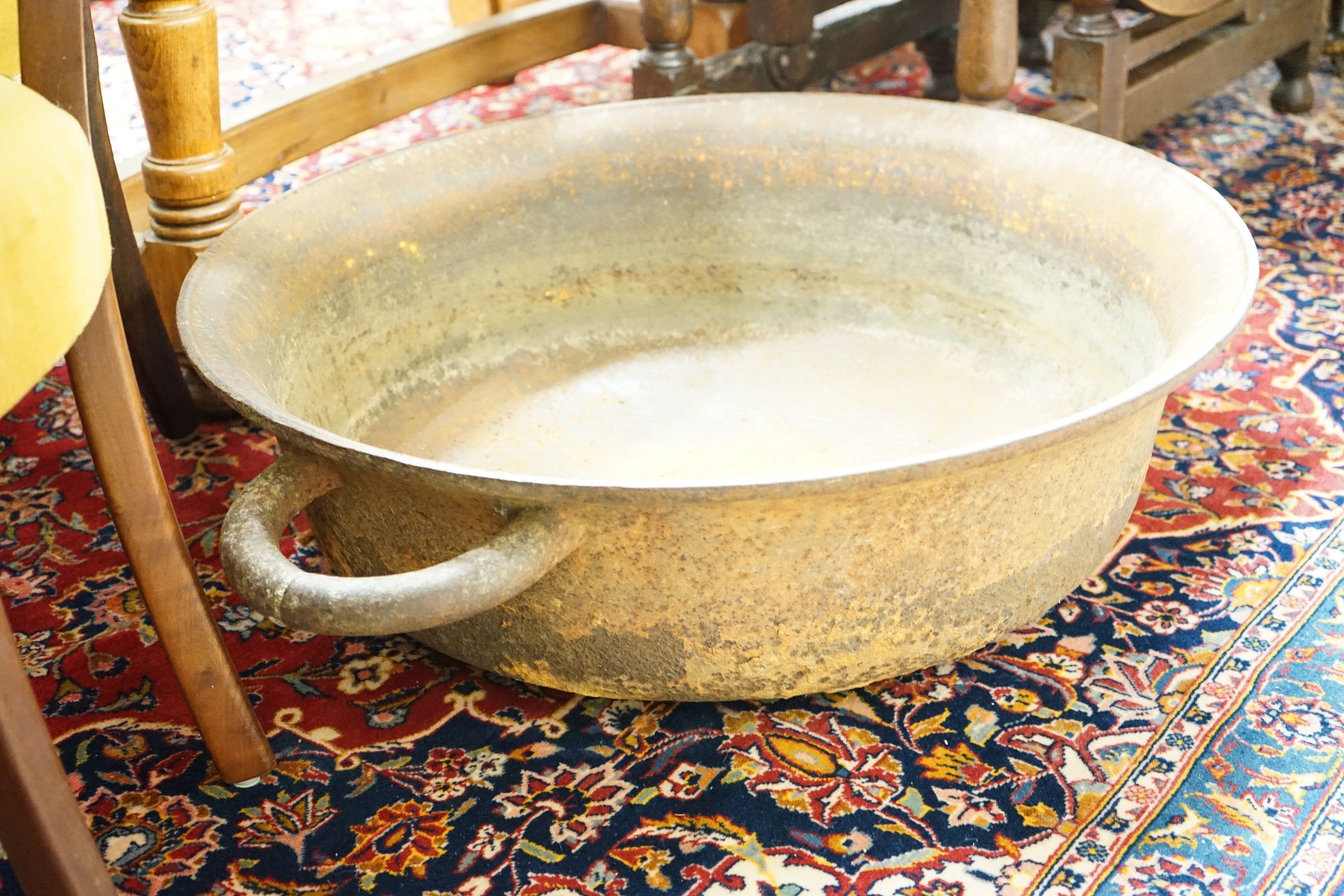 A large cast iron French circular preserve pan, diameter 82cm, height 26cm